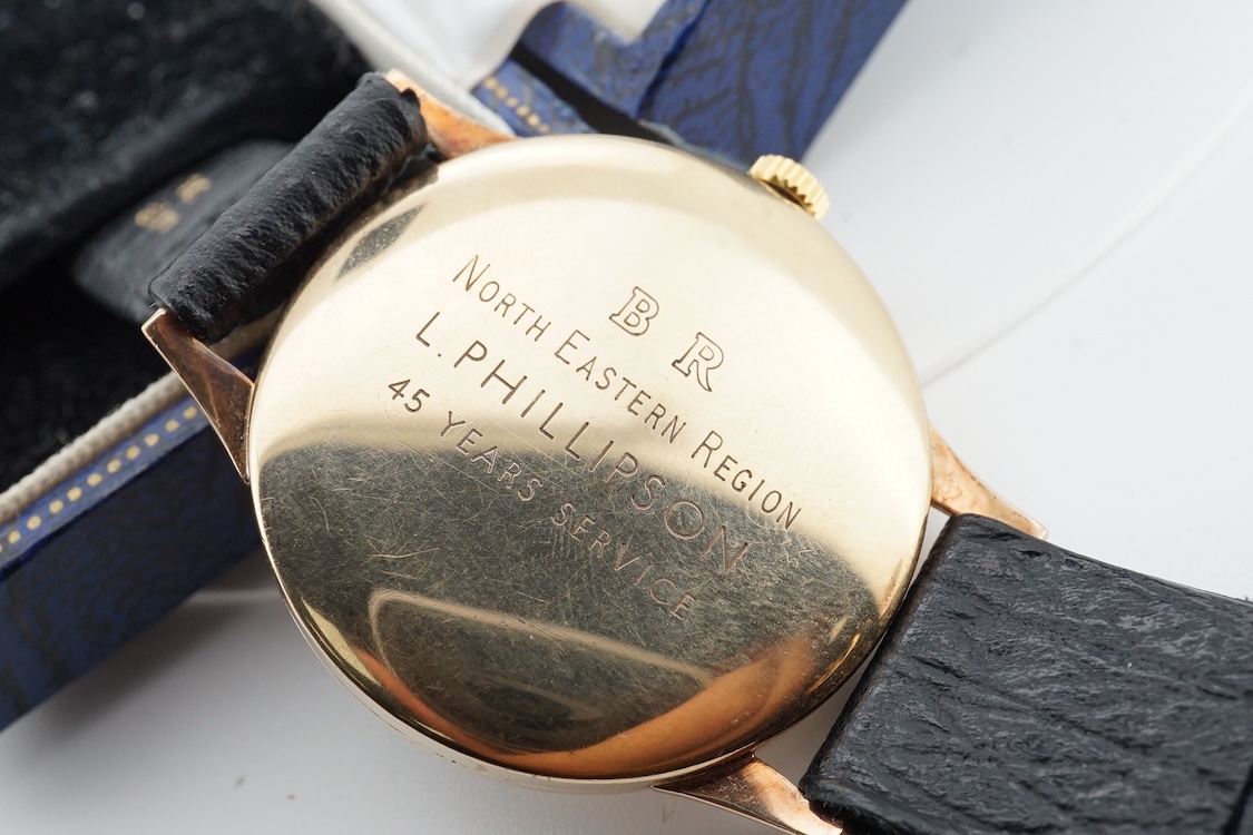 A gentleman's 9ct gold Tudor manual wind wrist watch, with Arabic numerals and subsidiary seconds, case diameter 32mm, on an associated leather strap, with a Garrards box.